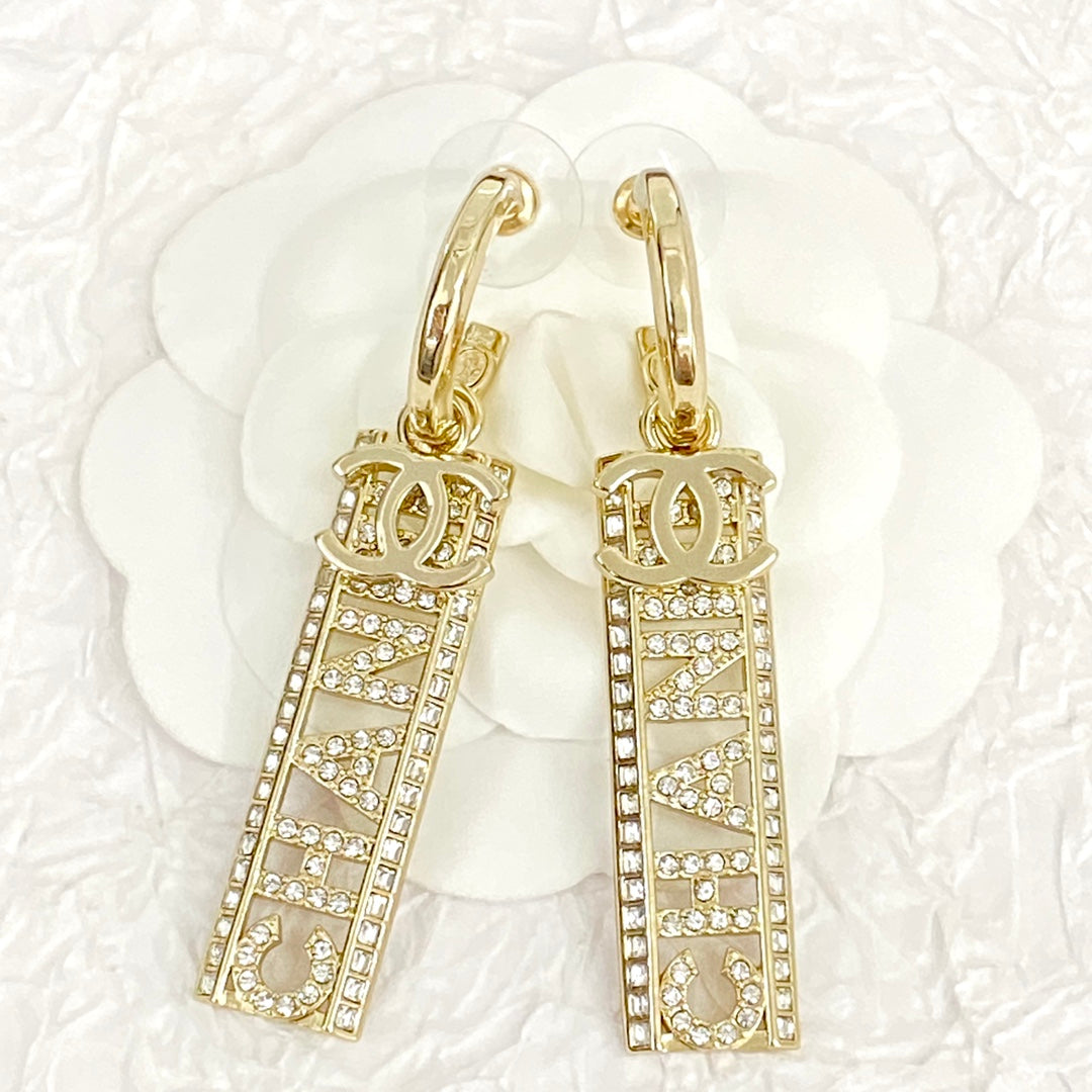 Chanel Text Diamond Paved Light Gold Drop Earrings