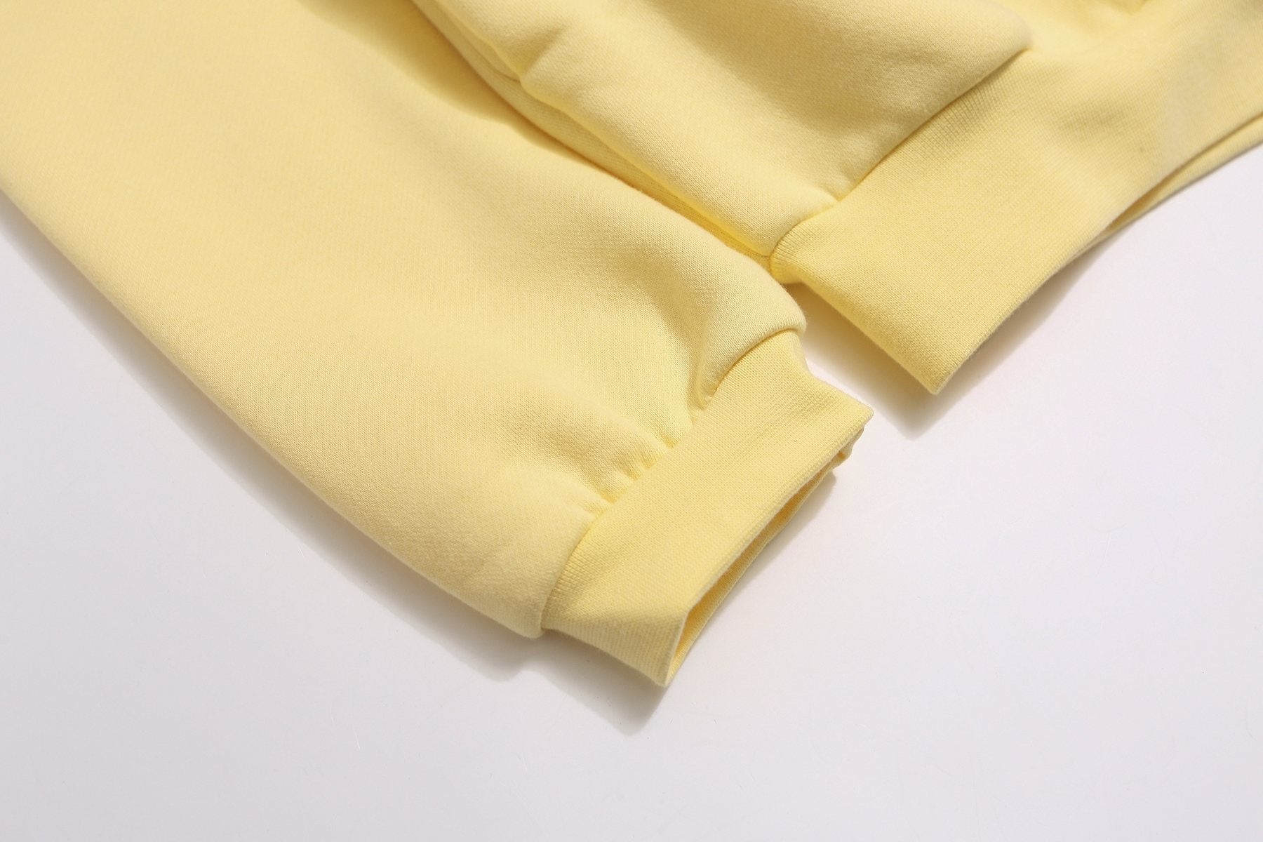FOG Educate the Young Pale Yellow Hoodie — detail