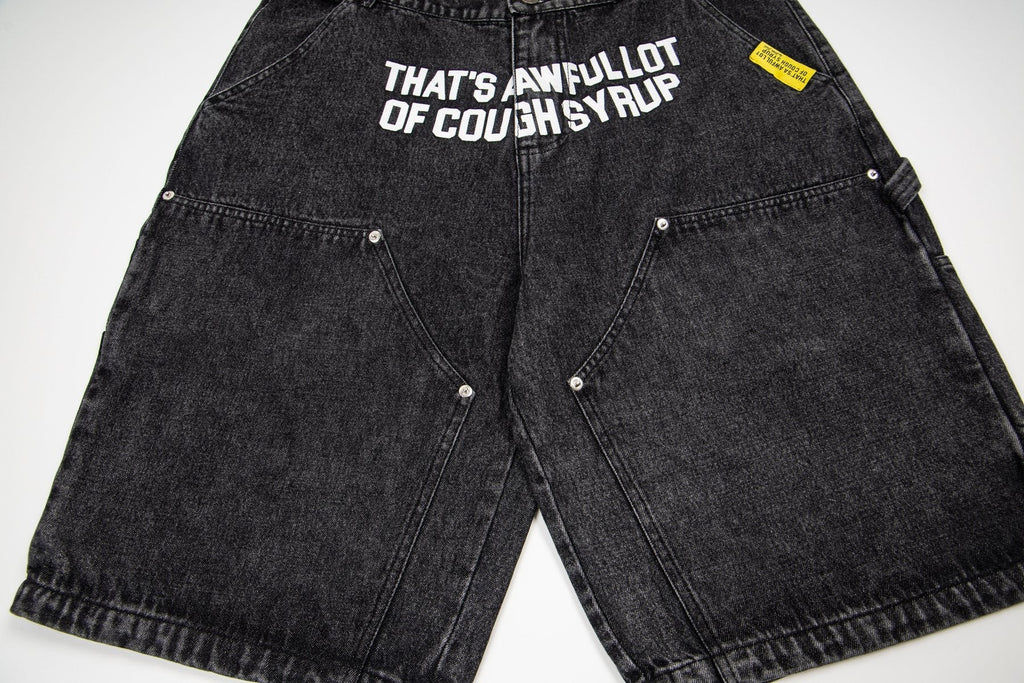 THAT'S A AWFUL LOT OF COUGH SYRUP Washed Denim Graphic Shorts — front